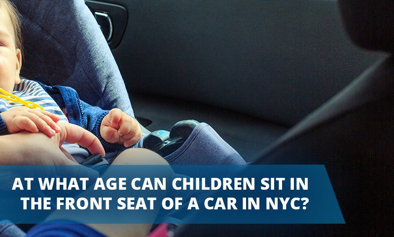 At what age can children sit in the front seat of a car in NYC